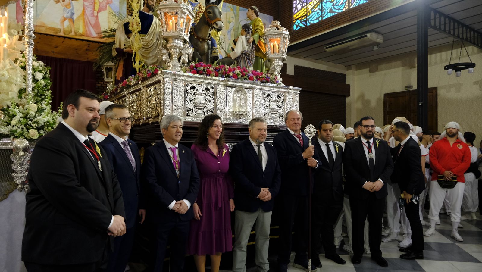 La Borriquita procesiona por las calles de Almería, en imágenes
