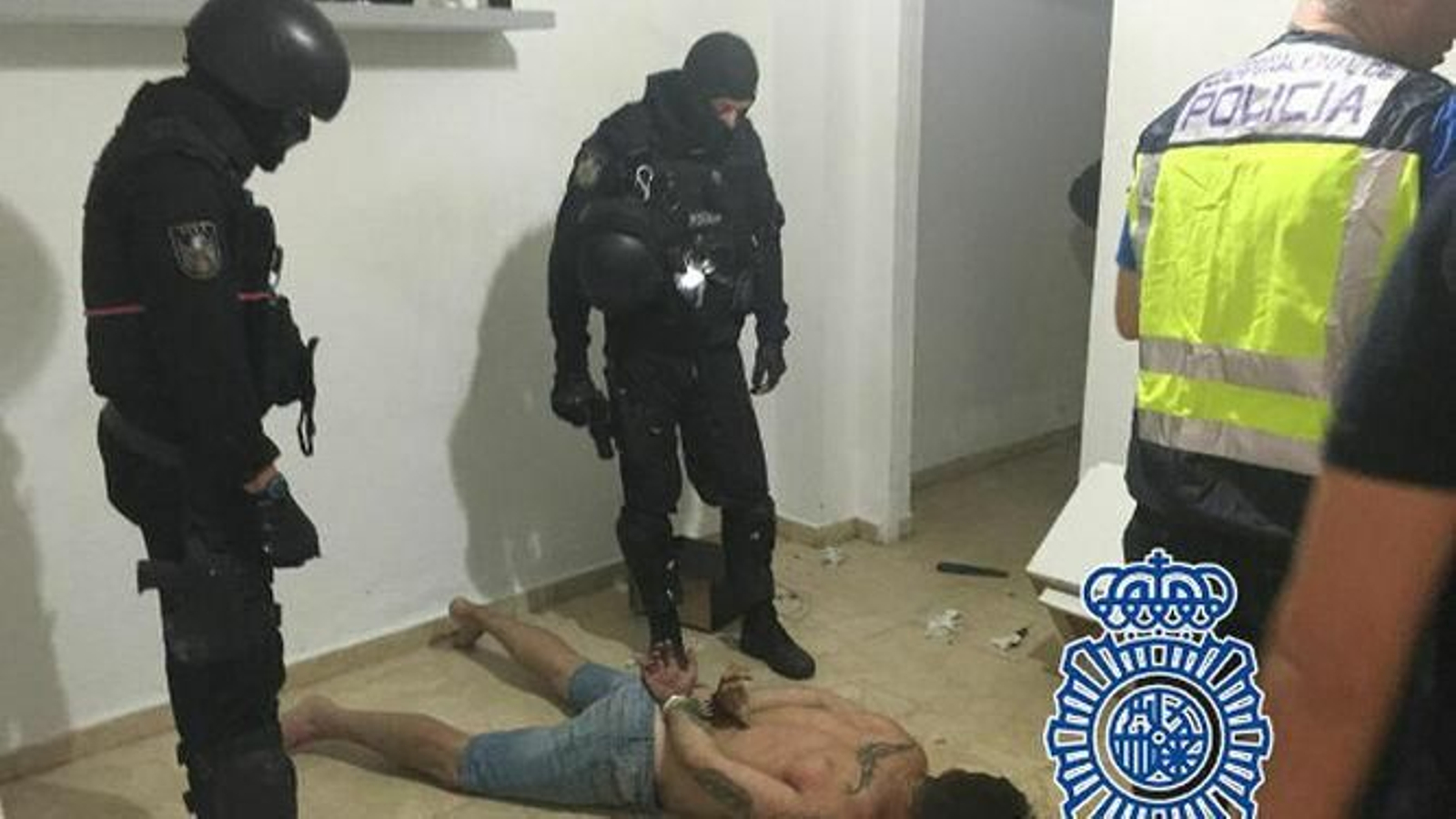 Momento de la detención de uno de los acusados