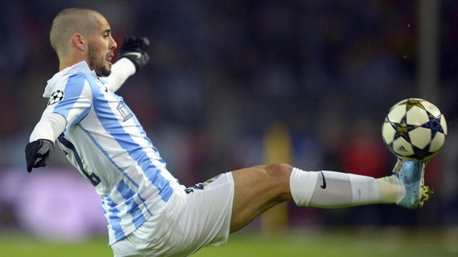 Las imágenes del Borussia Dortmund-Málaga, que cumple siete años.