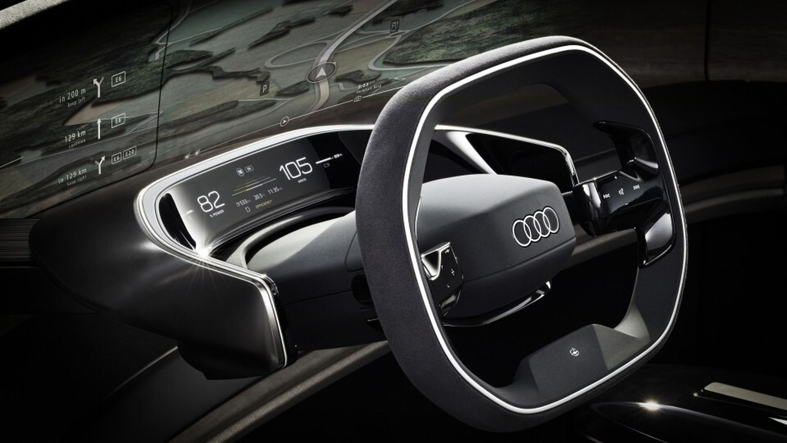 Las imágenes se proyectan sobre la madera que rodea el interior y el volante y su entorno adelantan un cockpit que podría ser reconocible en unos años en los coches de Audi.