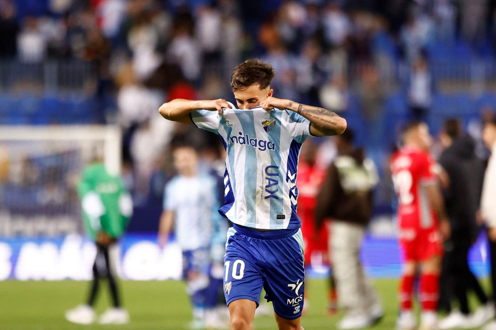 Las fotos del imponente ambiente en La Rosaleda en el Málaga - Córdoba CF