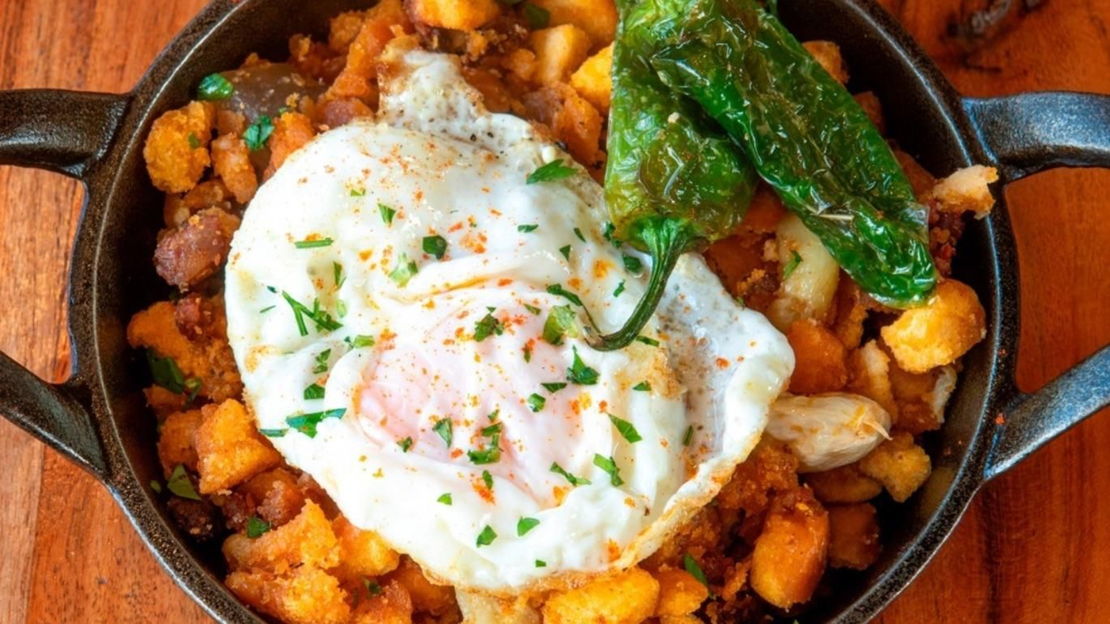 Migas con huevo frito y pimiento de El Moli