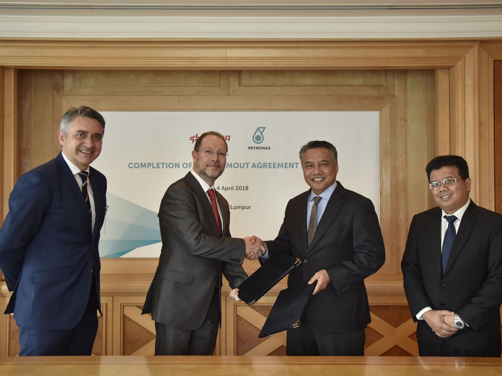 De izquierda a derecha: Rubén Baños, Francisco Claver, Azman B. A. Aziz, y Norafizal Mat Saad.