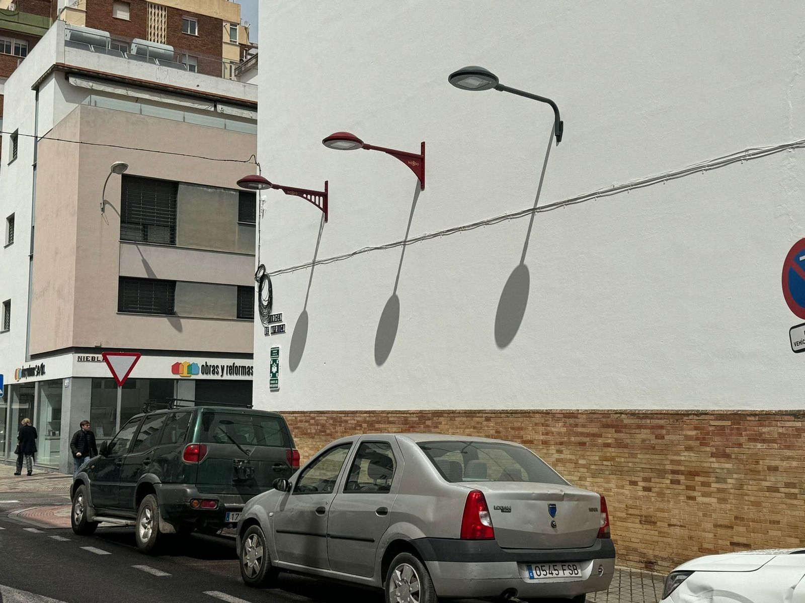 Los tres diseños de farolas que son objeto de sondeo.