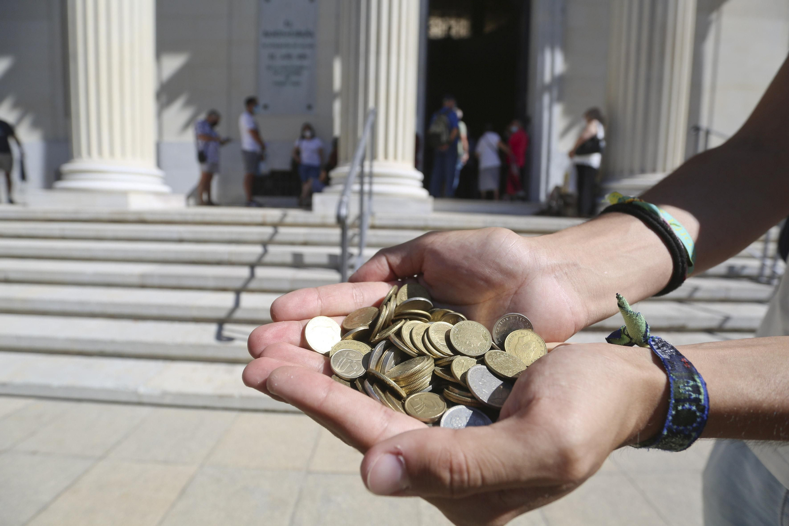 El último día de vida de las pesetas, en fotos