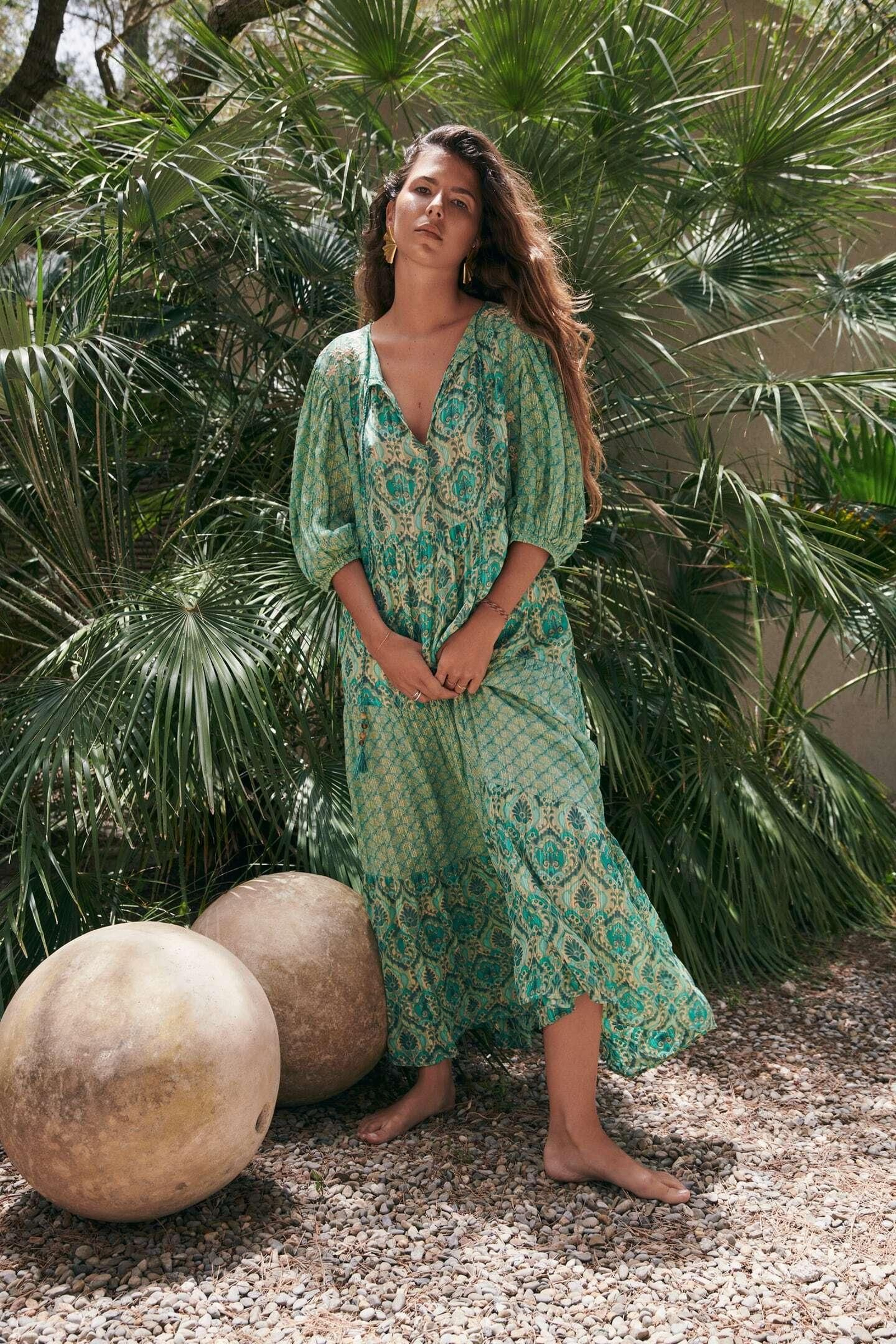 Vestido estampado con mangas abullonadas de Zara. Vestido estampado con mangas abullonadas de Zara.
