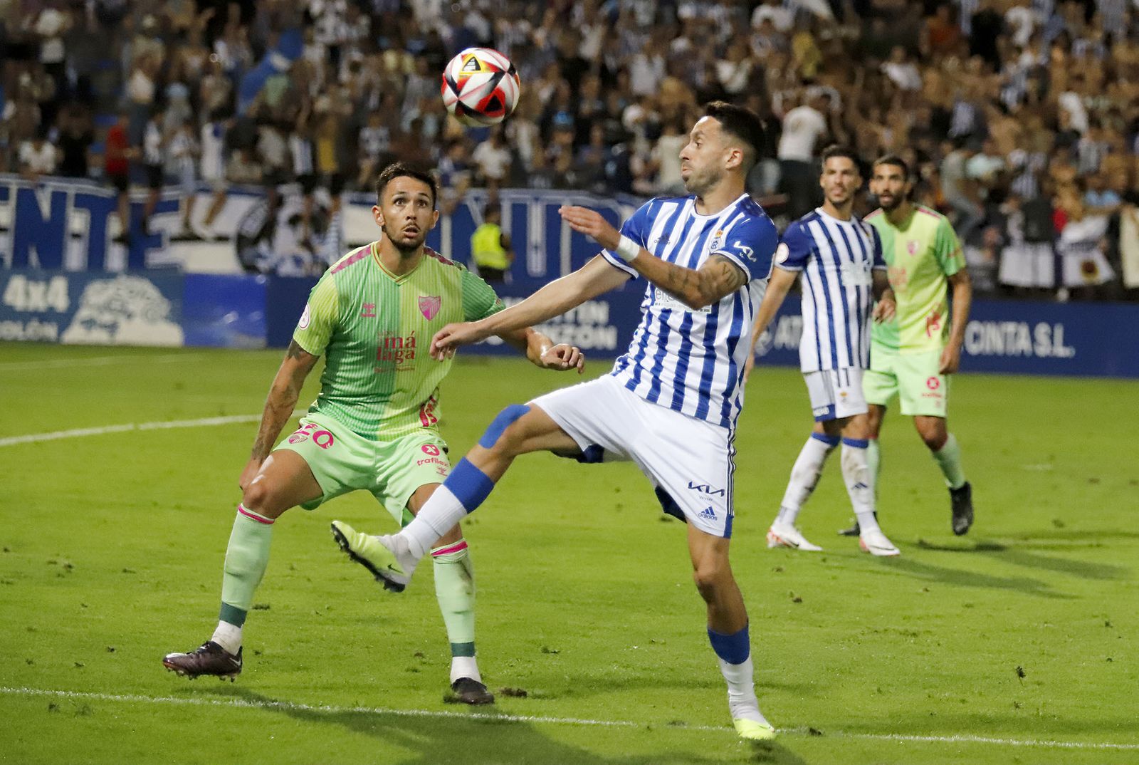 Imágenes del encuentro entre el Recreativo de Huelva y el Málaga