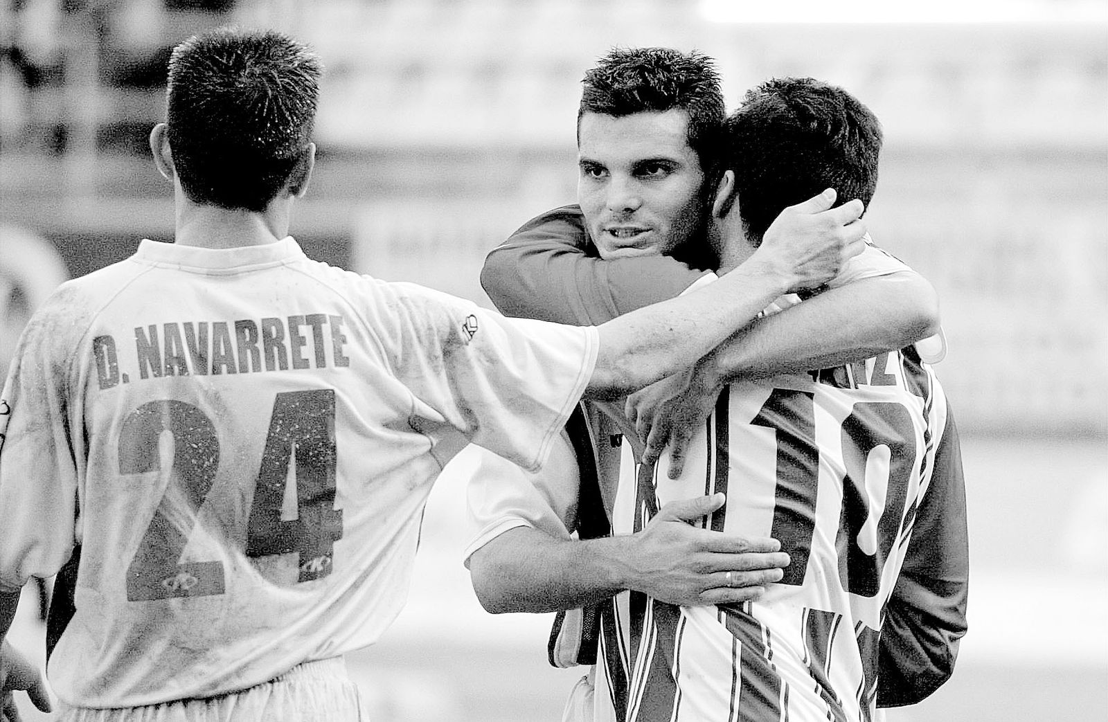 Andrés Armada se abraza con Ortiz