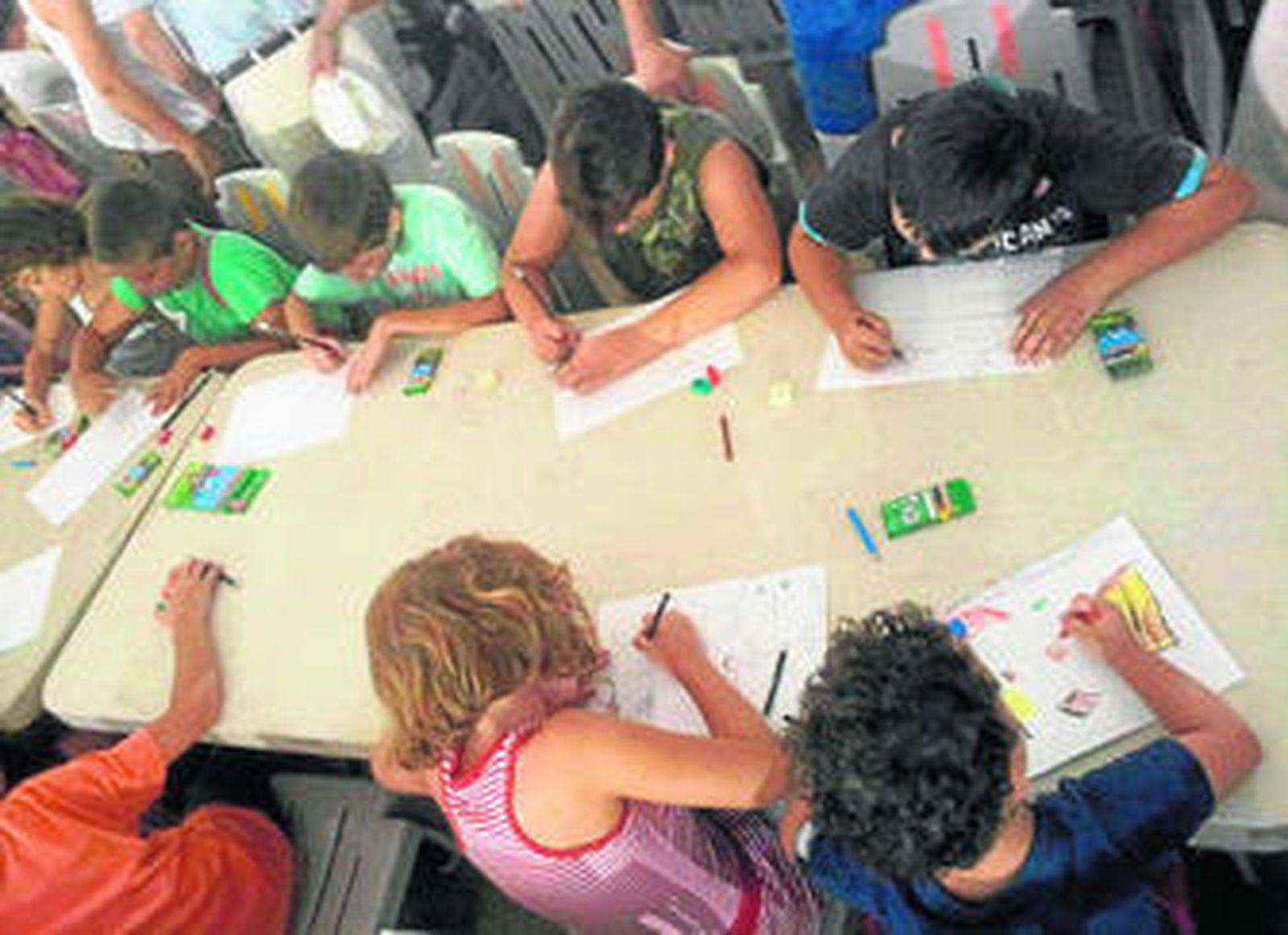 Los más pequeños ilustran su propia visión de la Feria.