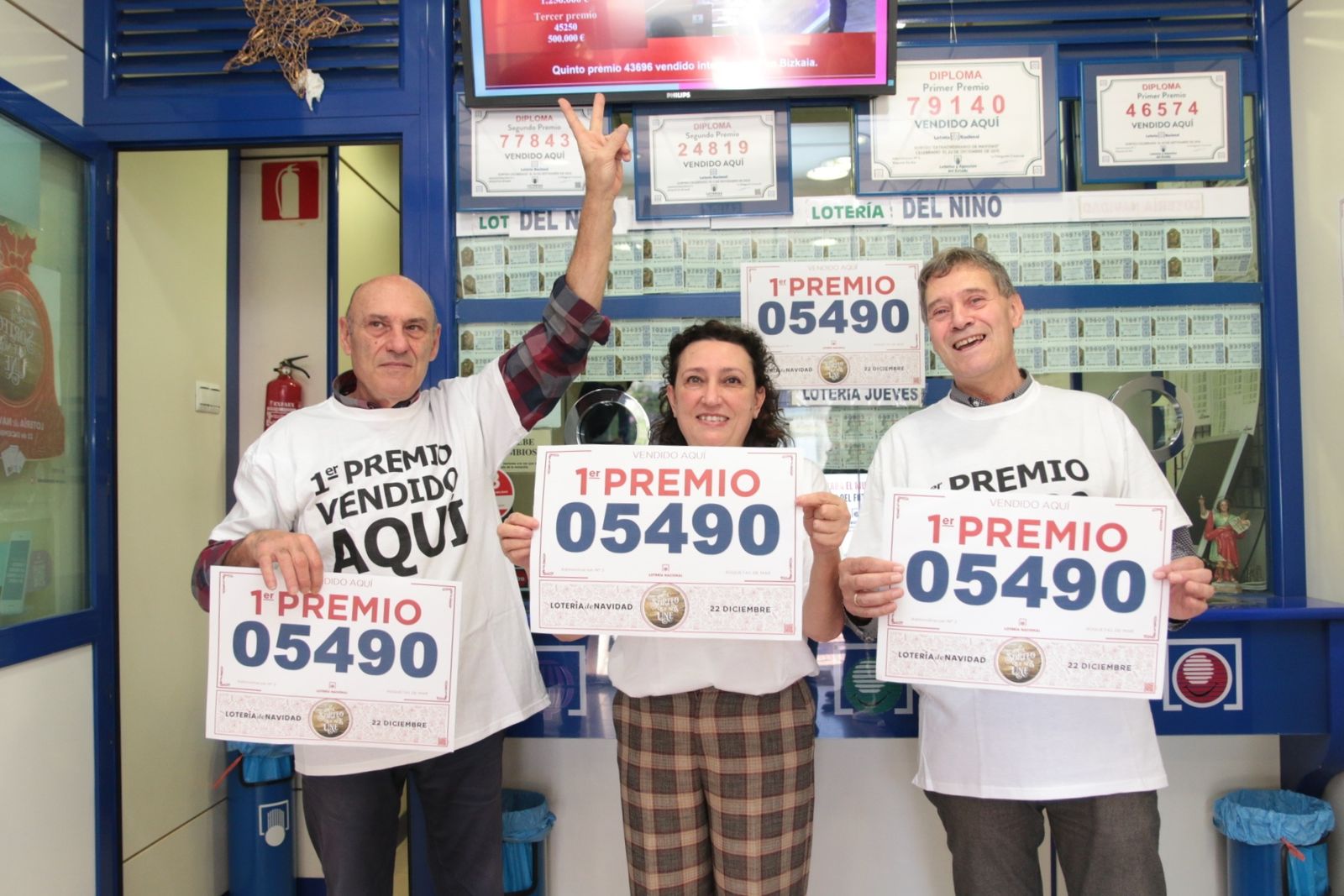 Imágenes de los premiados por la Lotería de Navidad en Almería y provincia