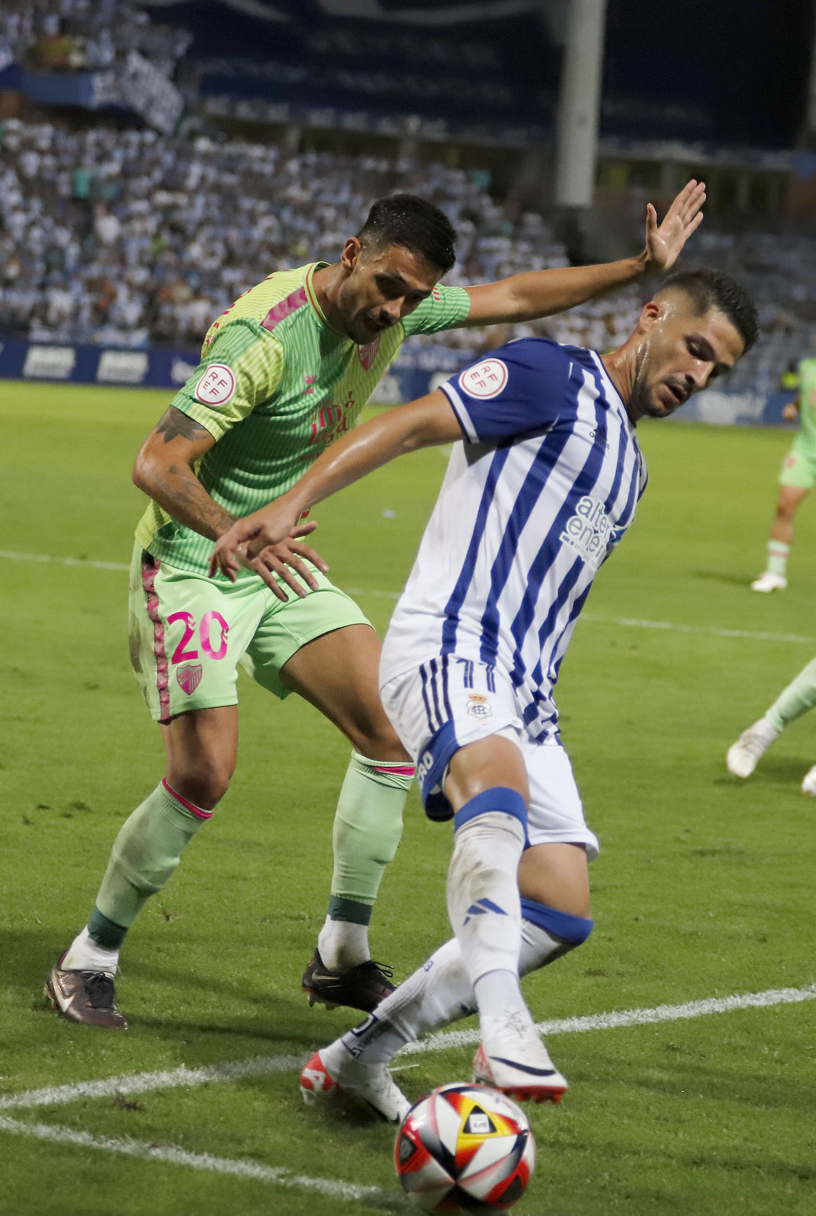 Imágenes del encuentro entre el Recreativo de Huelva y el Málaga