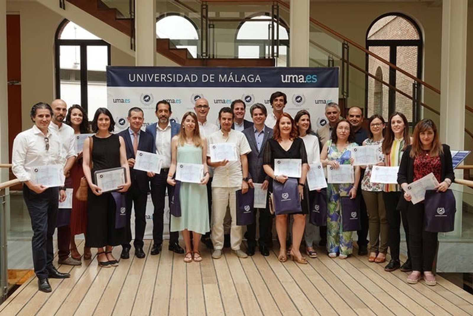 Foto de familia de los profesores de la UMA premiados.