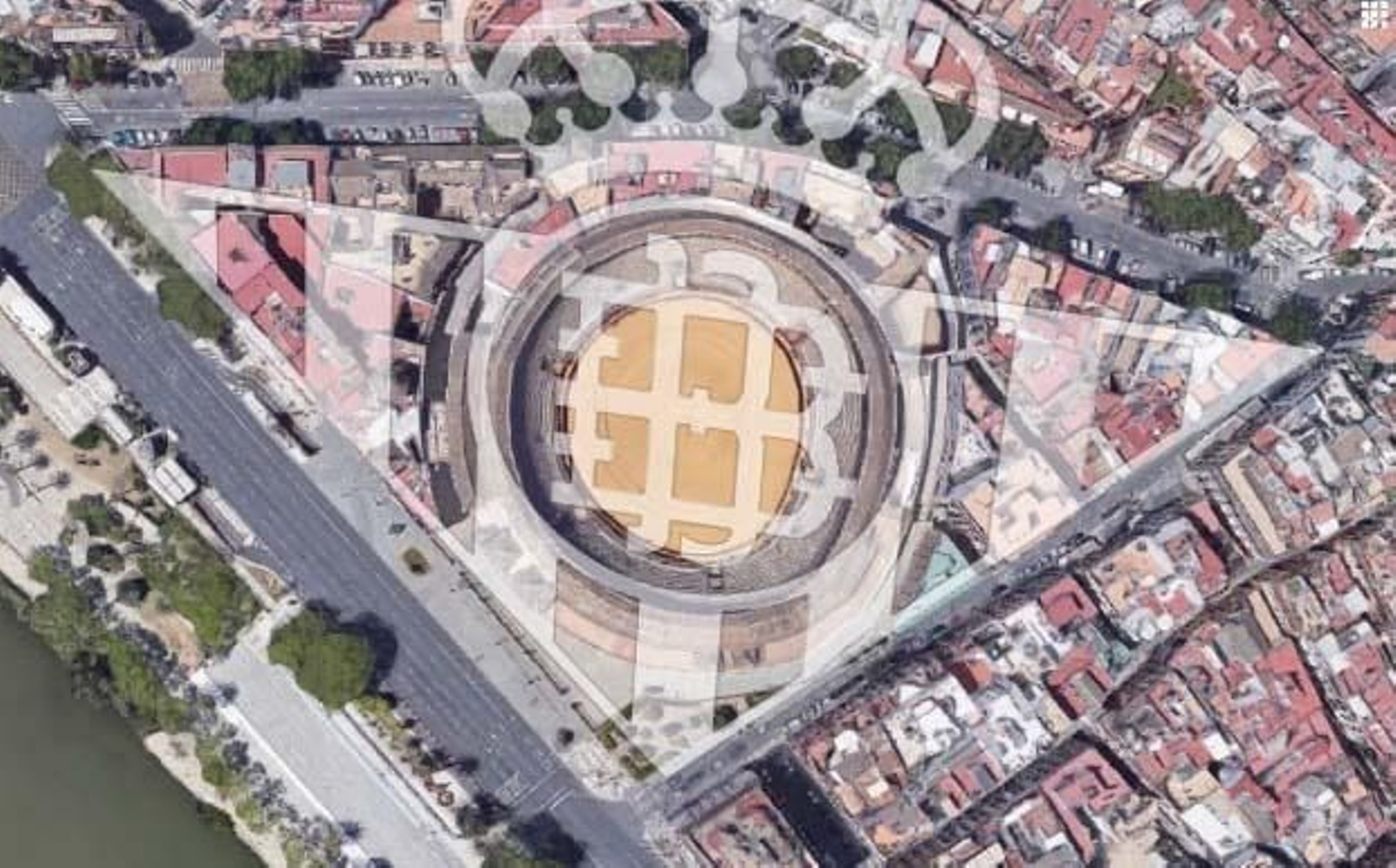 El escudo del Betis sobre la plaza de toros de la Maestranza y su entorno.