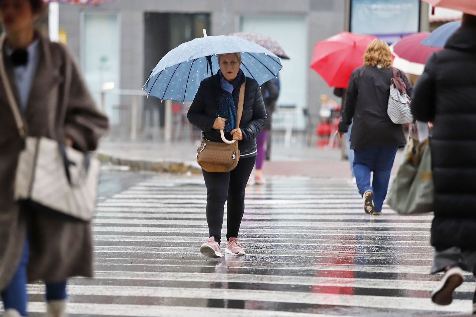 imágenes de la lluviosa mañana en Huelva