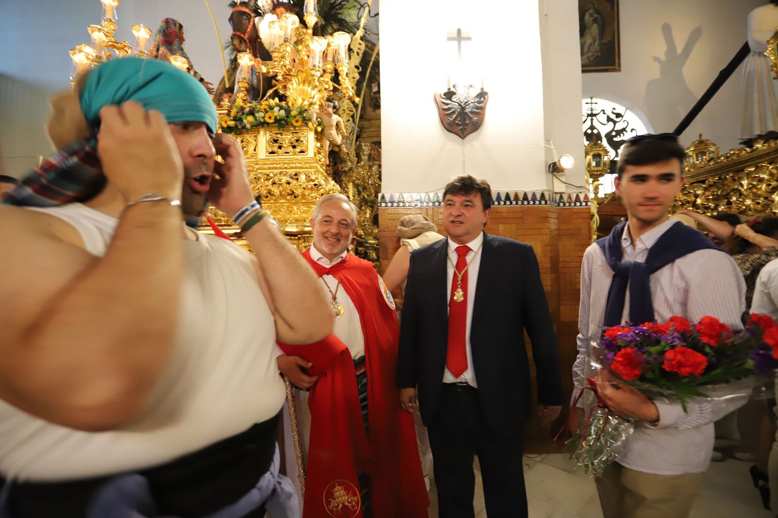 Imágenes del recorrido de la Borriquita  por las calles de Huelva