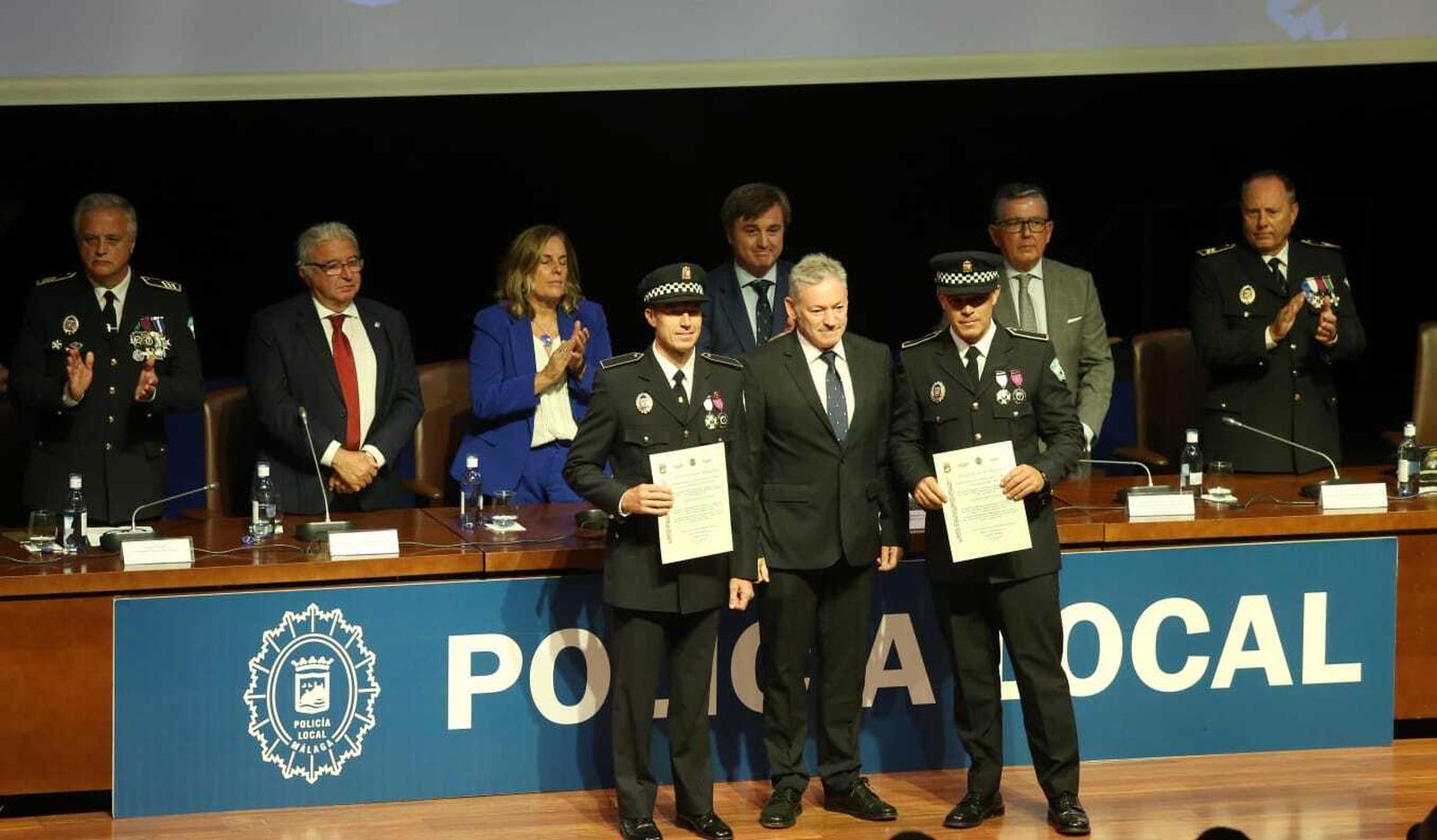 Las imágenes del acto de distinción de agentes de la Policía Local de Málaga en el día de su patrón