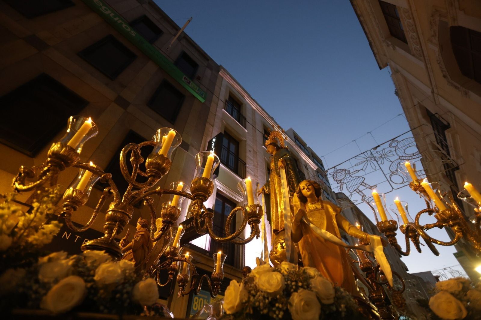 La procesión de la Virgen de la Milagrosa de Córdoba, en imágenes