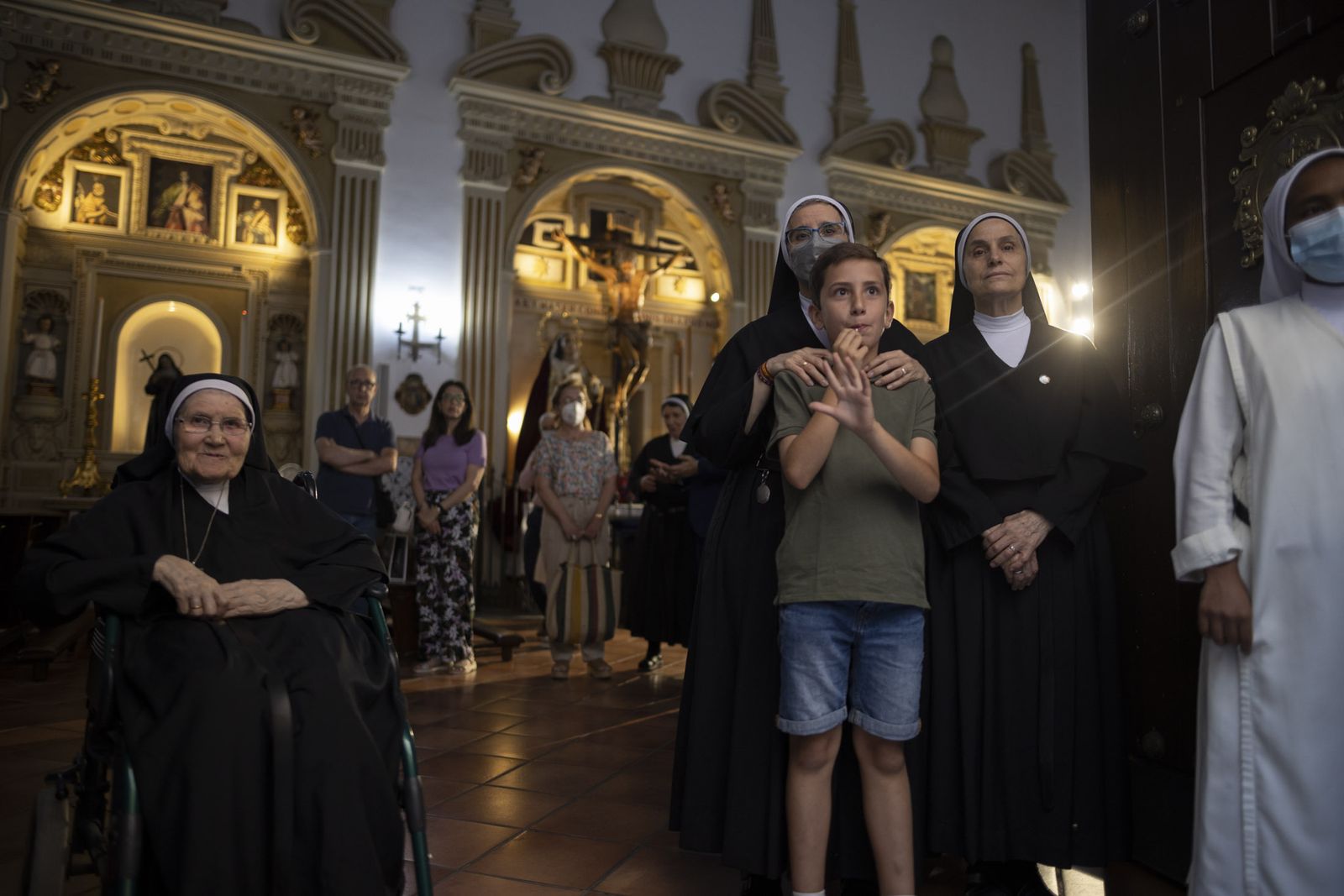 Imágenes de la salida extraordinaria de La Borriquita por las calles de Huelva