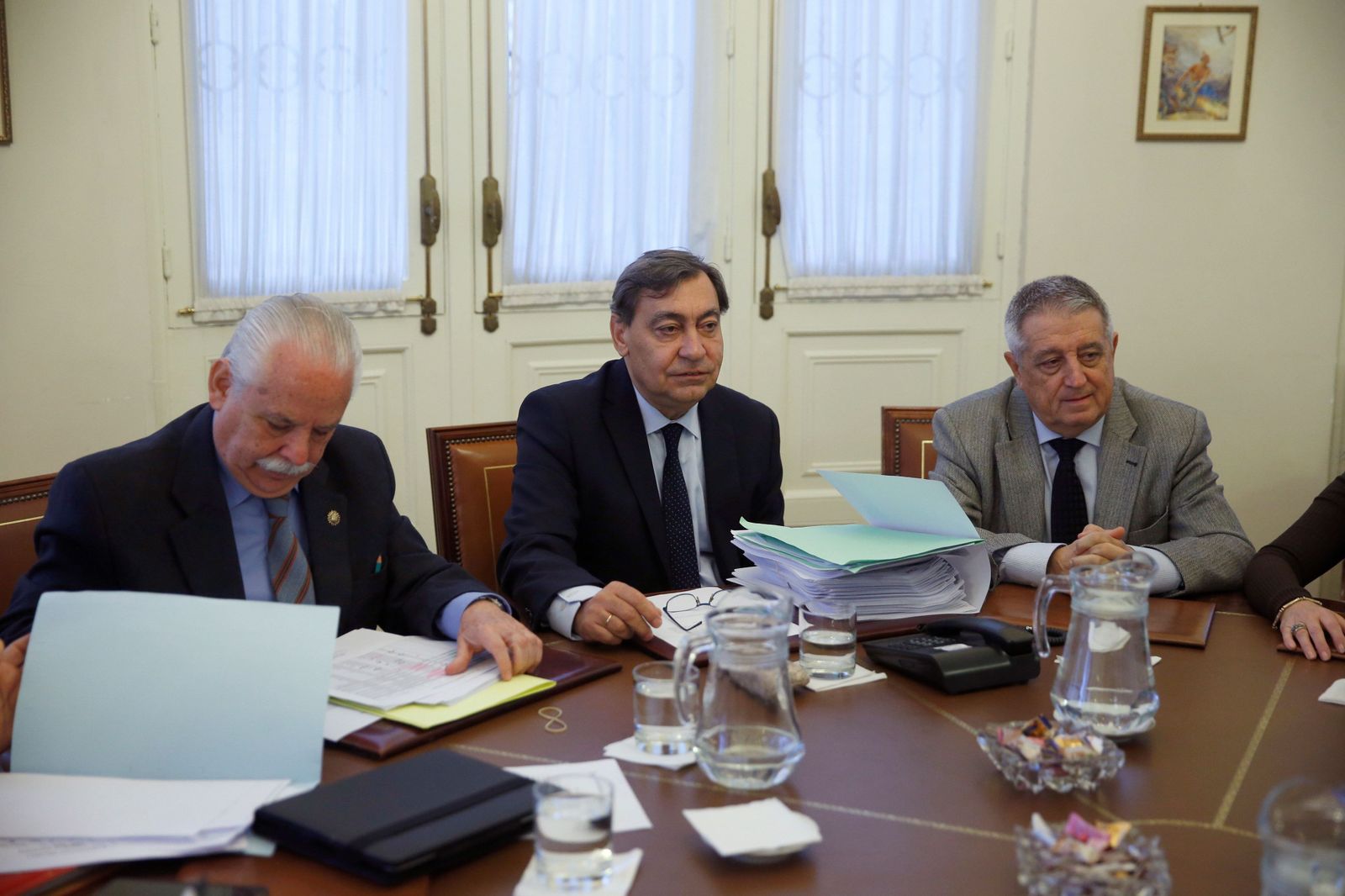 El fiscal general del Estado, Julián Sánchez Melgar (centro), ayer en la reunión del Consejo Fiscal.