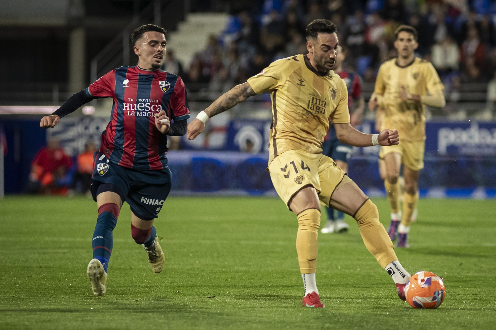 El Huesca-Málaga CF, en fotos