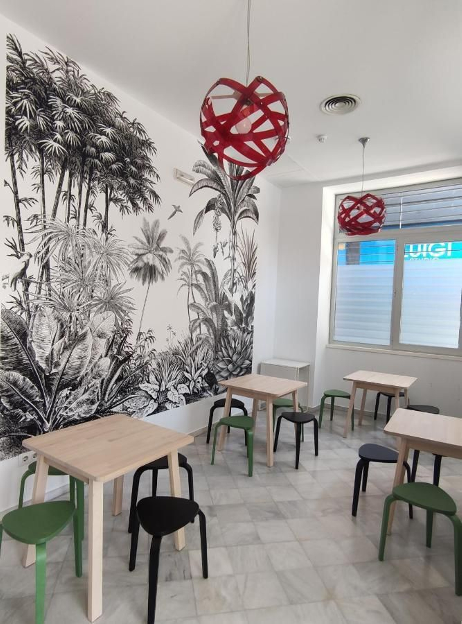 Zona del desayuno en New Samay Hostel