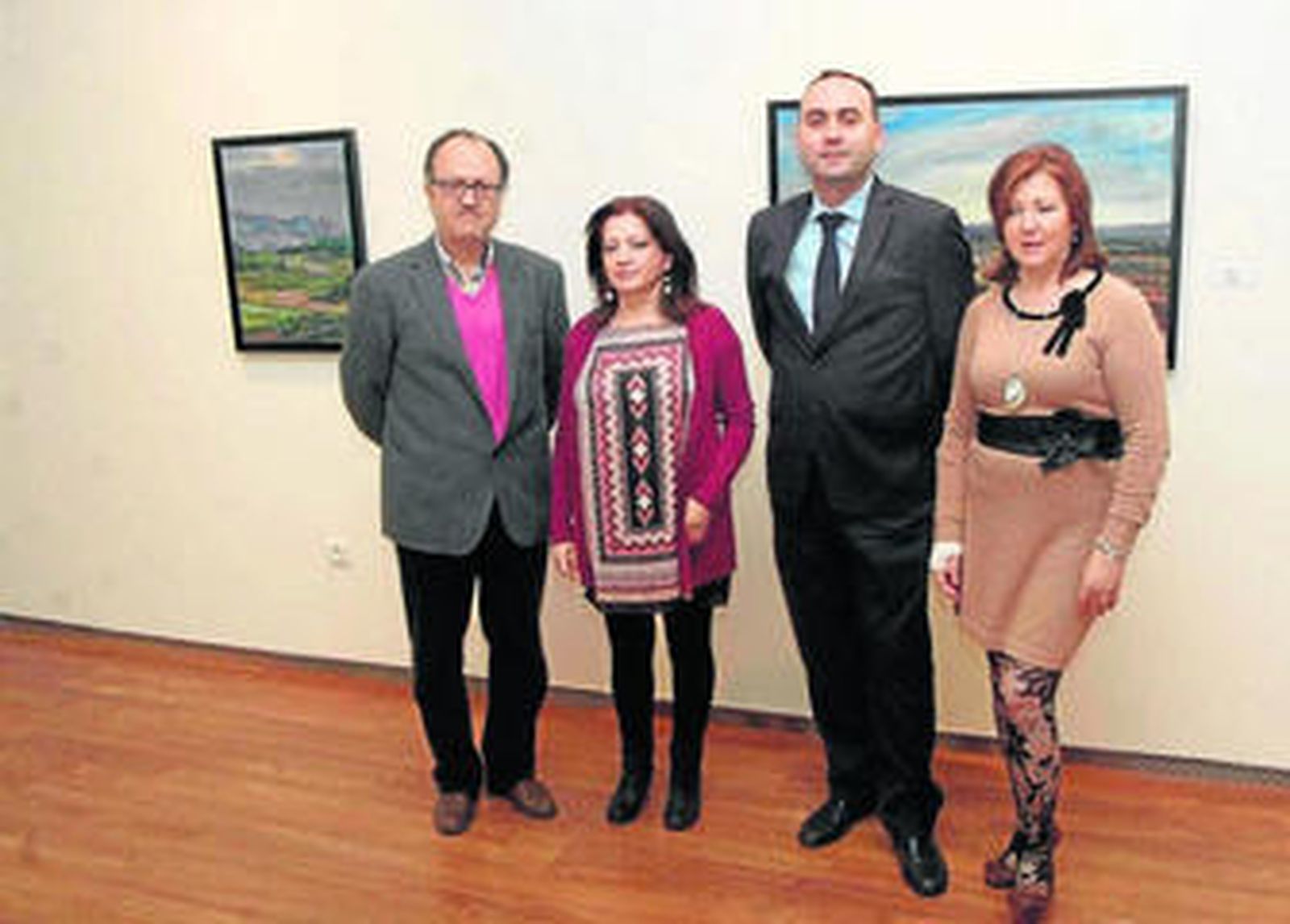 Alfonso Ibáñez con Antonia González, Juan Luis Padilla de Unicaja y María González.