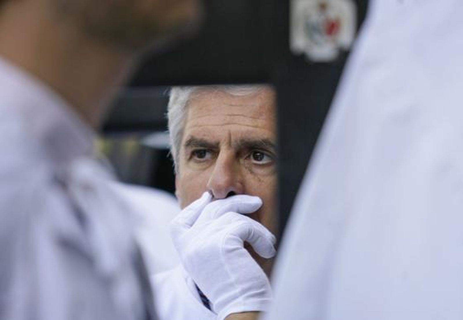 Primer plano de un penitente sin capirote.

Foto: Antonio Pizarro