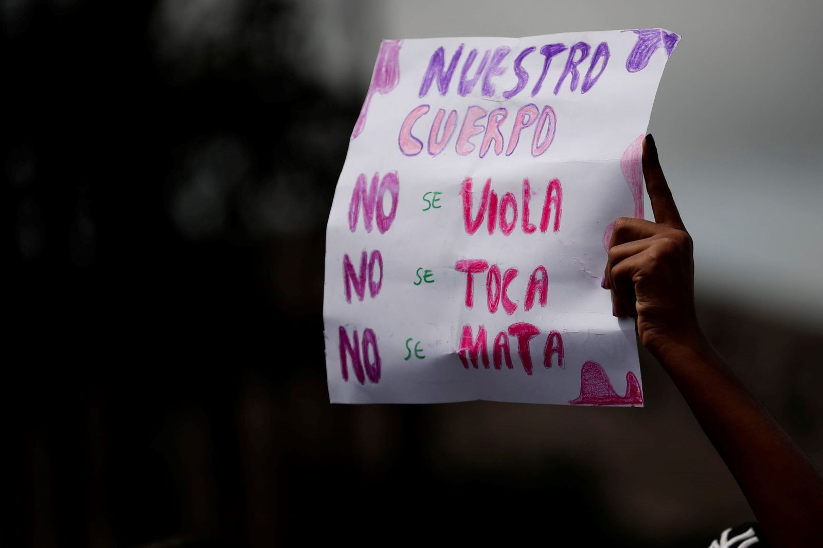Cartel contra la violación en una manifestación.