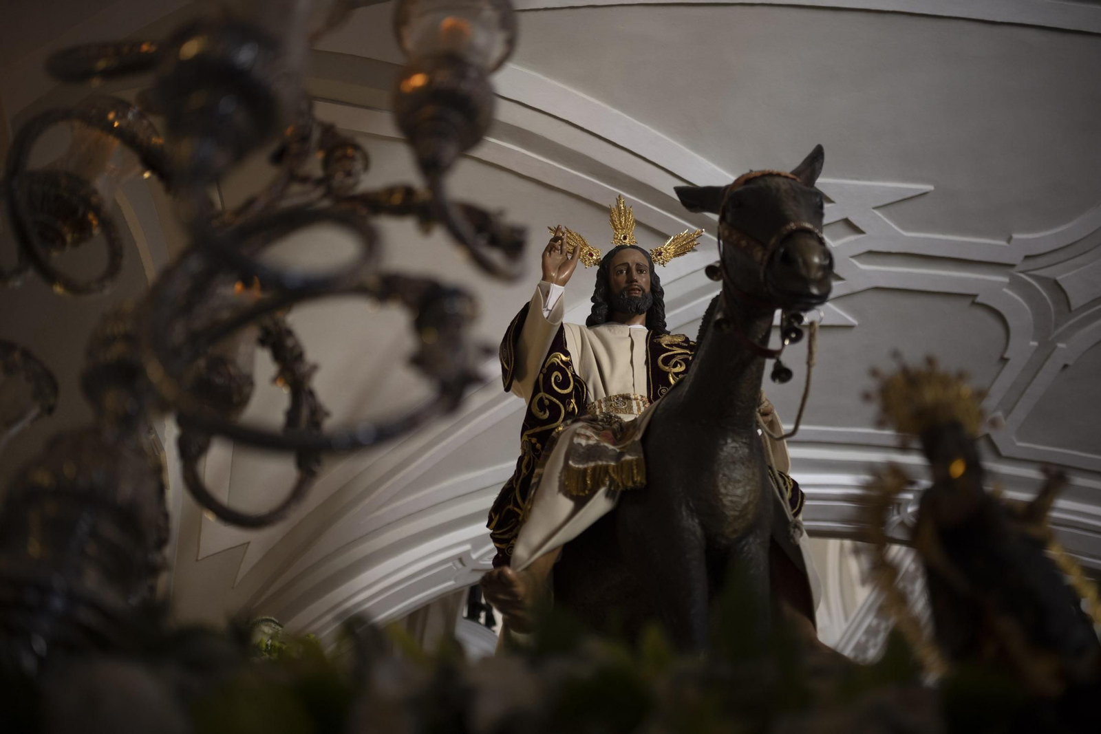 Imágenes de la salida extraordinaria de La Borriquita por las calles de Huelva