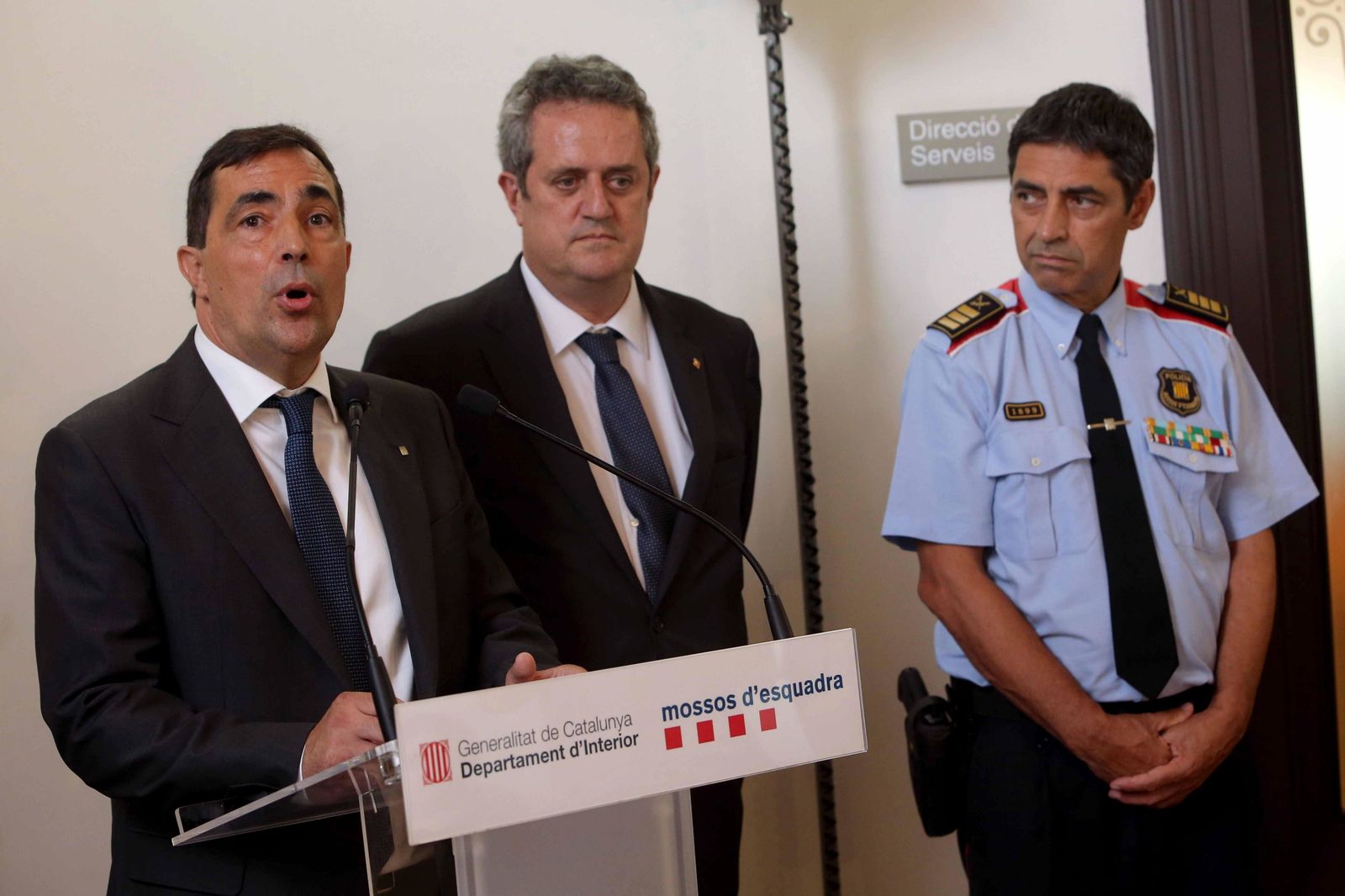 Joaquim Forn (i), con Pere Soler (c).