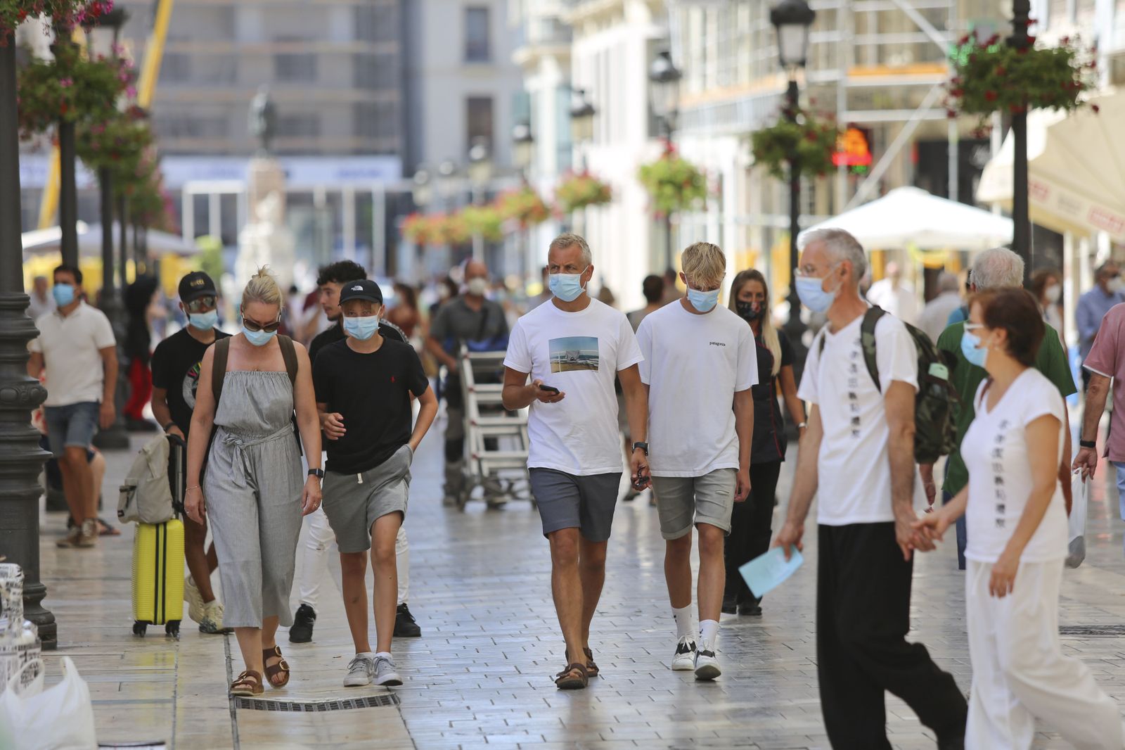 Fotos del primer día de mascarillas obligatorias en las playas y el Centro de Málaga