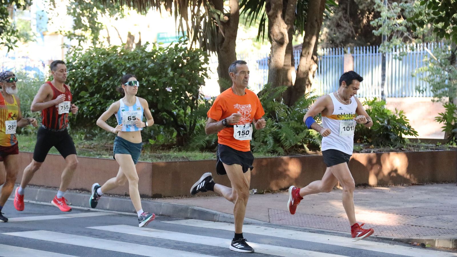 Búscate en las fotos de la Carrera de la Prensa en Málaga