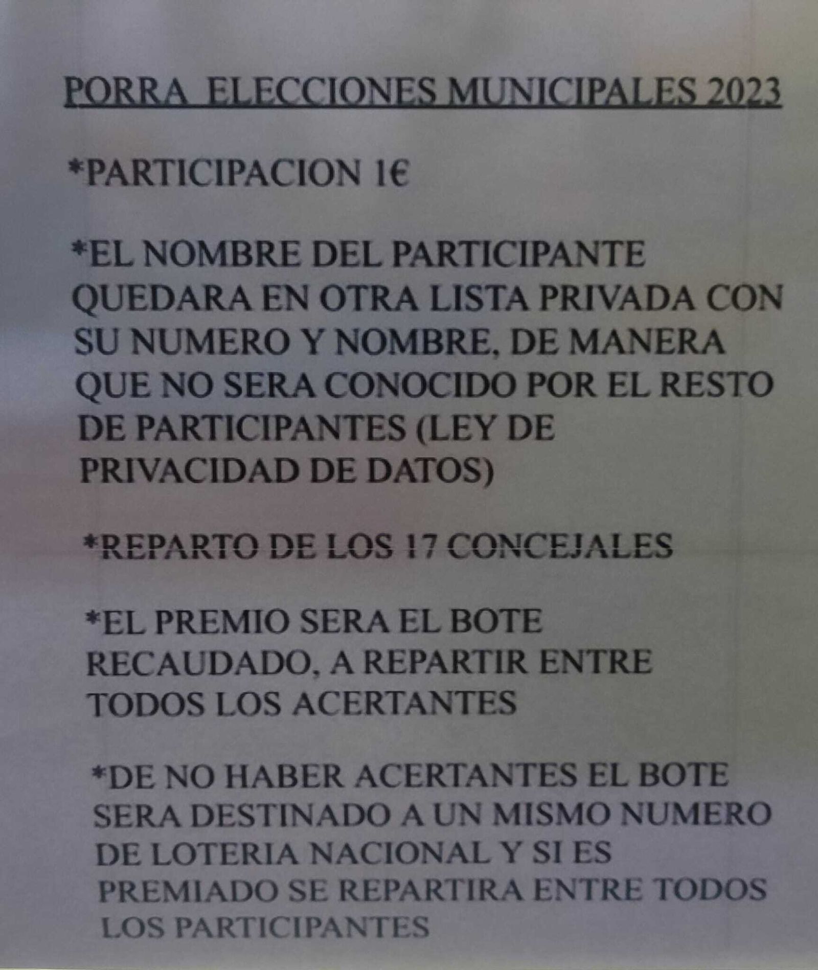 Cartel con el anuncio de la porra de la peluquería.
