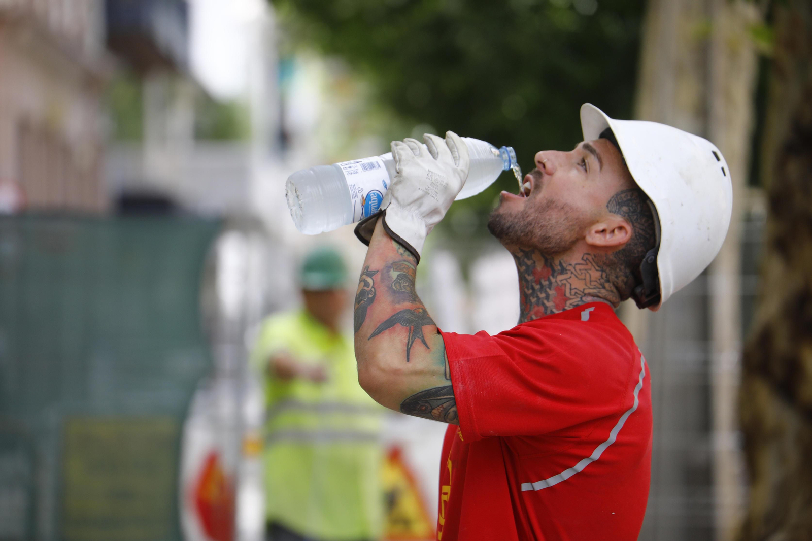 Las fotografías de los cordobeses que trabajan en primera línea del calor