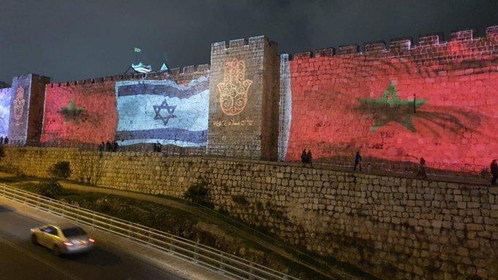 La muralla de Jerusalén con las banderas de Israel y Marruecos para celebrar el establecimiento de relaciones entre ambos países en 2020. La muralla de Jerusalén con las banderas de Israel y Marruecos para celebrar el establecimiento de relaciones entre ambos países en 2020.