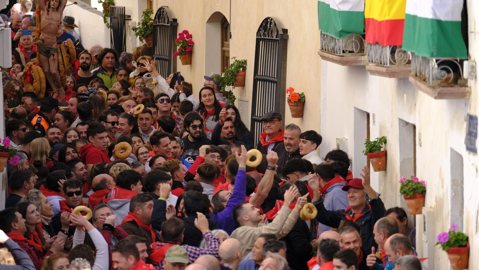 Procesión de San Sebastián y tirada de roscos en Lubrín, en imágenes