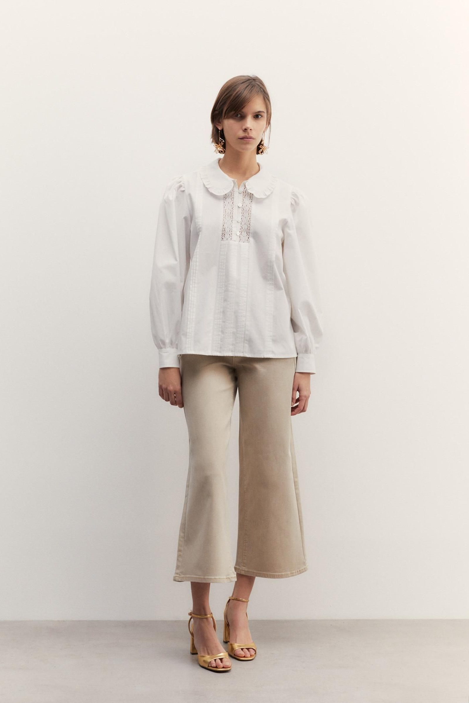 Blusa blanca de Sfera.