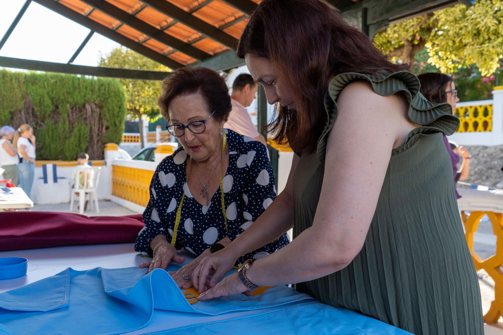 Imágenes de los talleres de la Hermandad de la Victoria de las decoraciones para La Magna Mariana