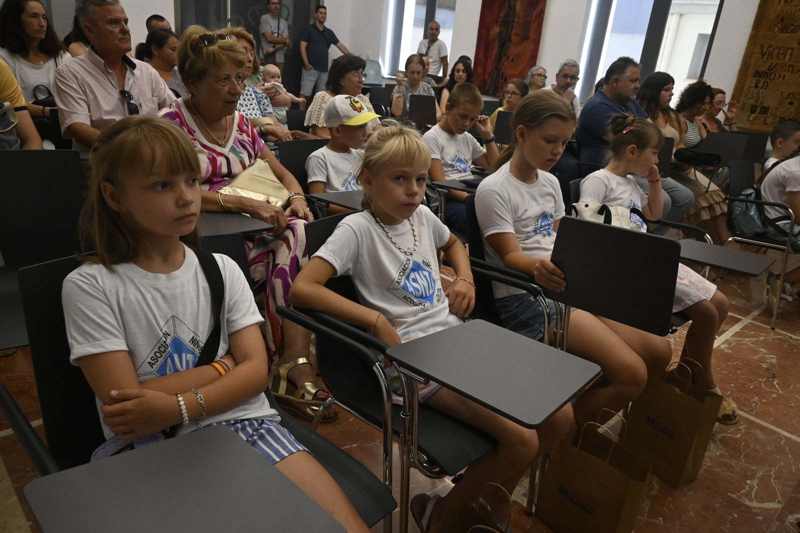 Menores ucranianos pasarán el verano en familias de acogida, en imágenes