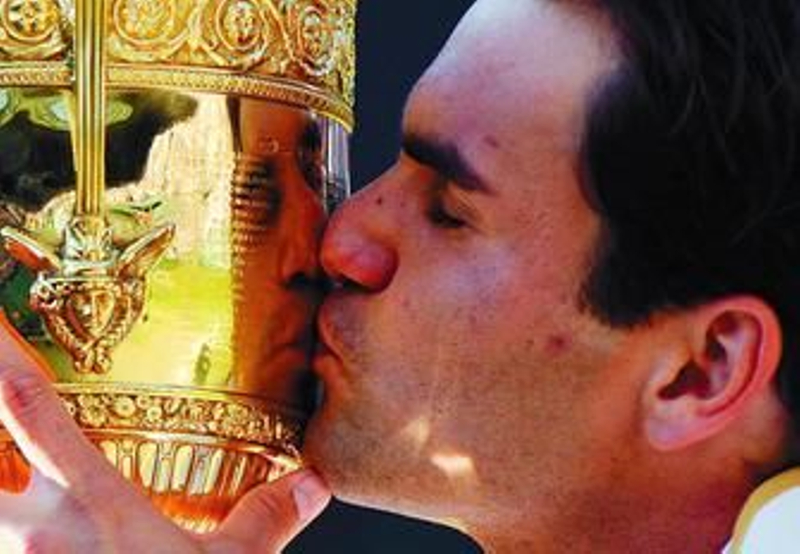 Federer, emocionado, celebra el último punto del partido.