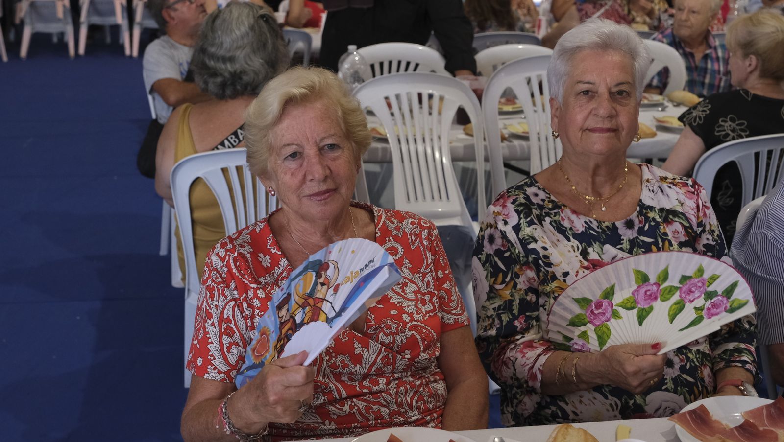 Imágenes de la comida homenaje a los mayores en la Caseta Municipal de la Feria de Almería 2022