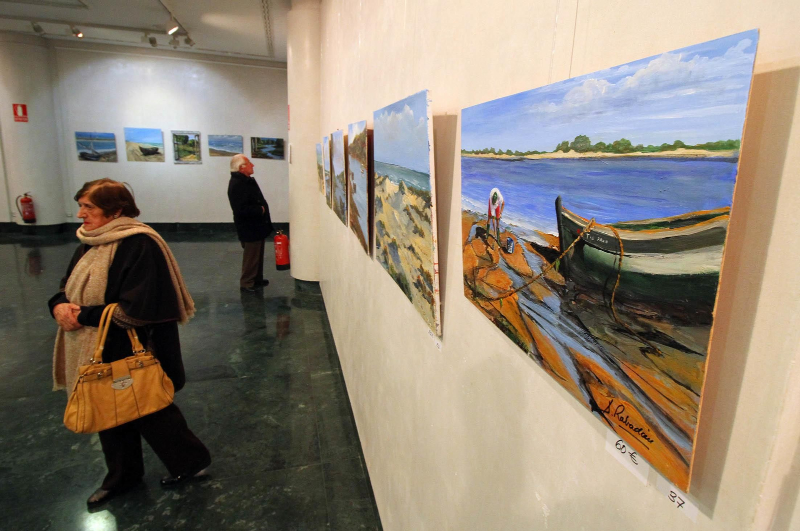 Imágenes de la Inauguración de la exposición del taller de arteterapia de Aramburu en la sala de la Caja Rural del Sur