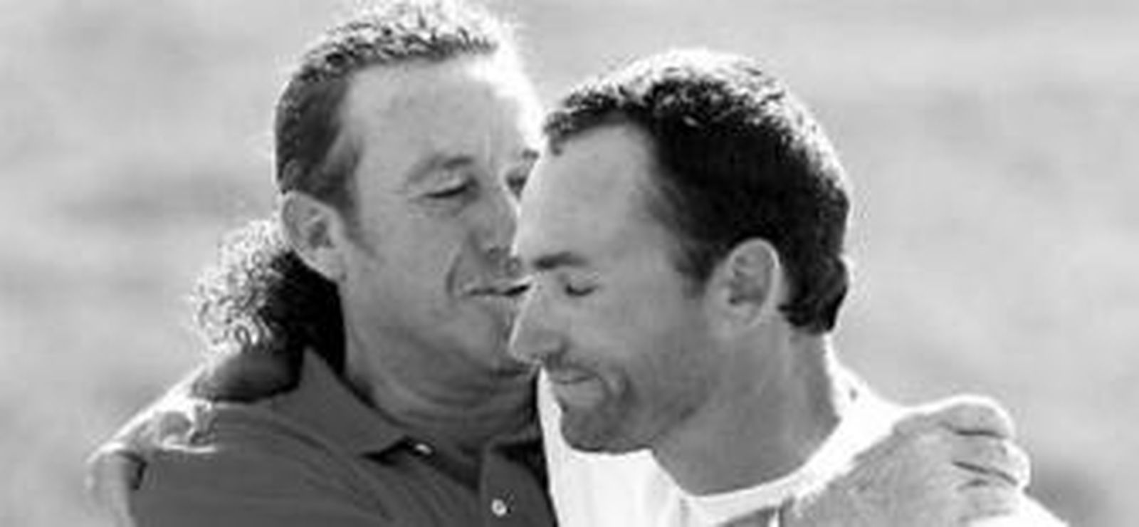 Miguel Ángel Jiménez consuela a Garrido.