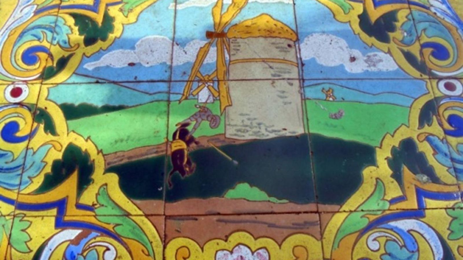 La famosa escena de la aventura con los molinos de viento (Libro I, capítulo 8).