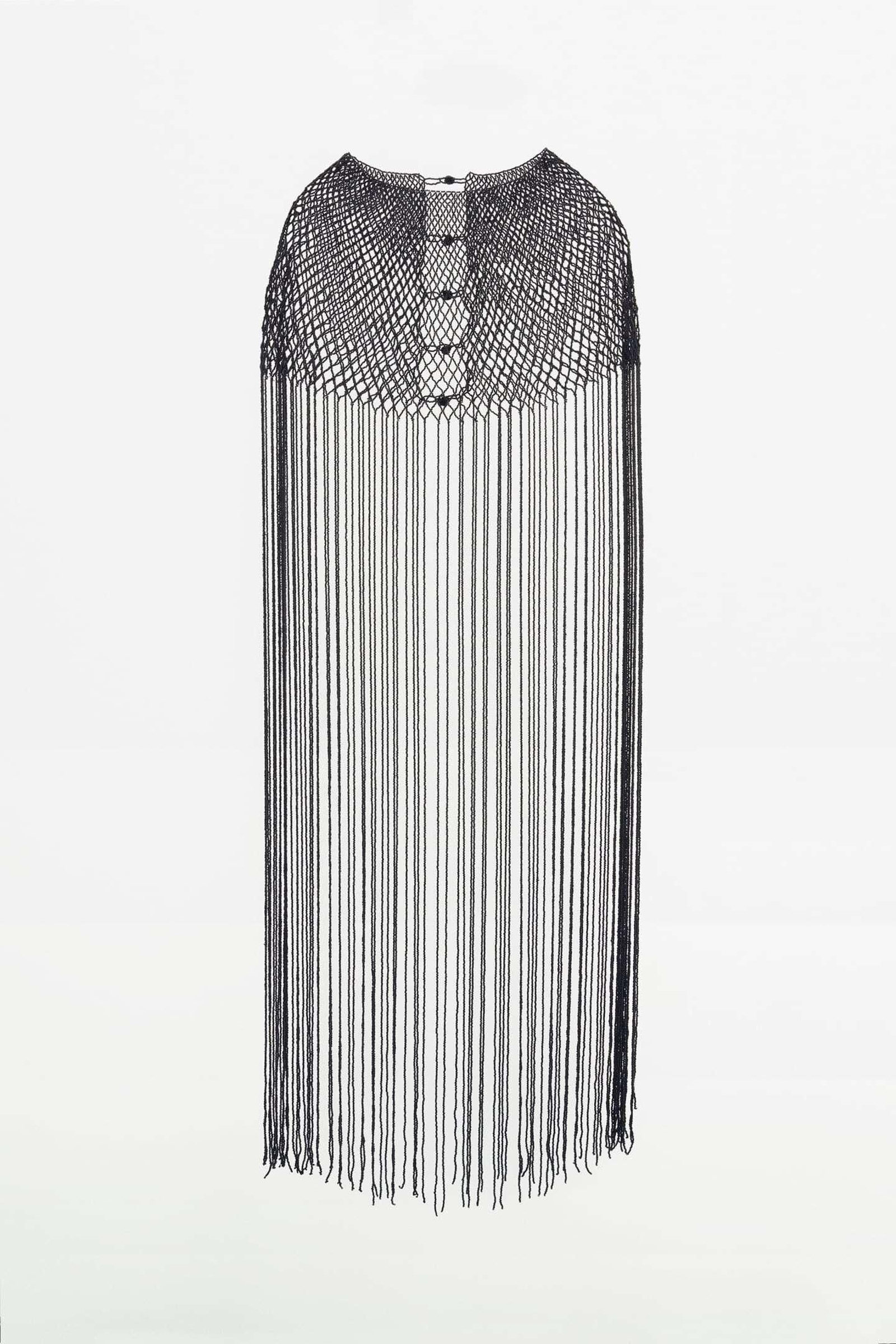 Top de flecos de Zara.