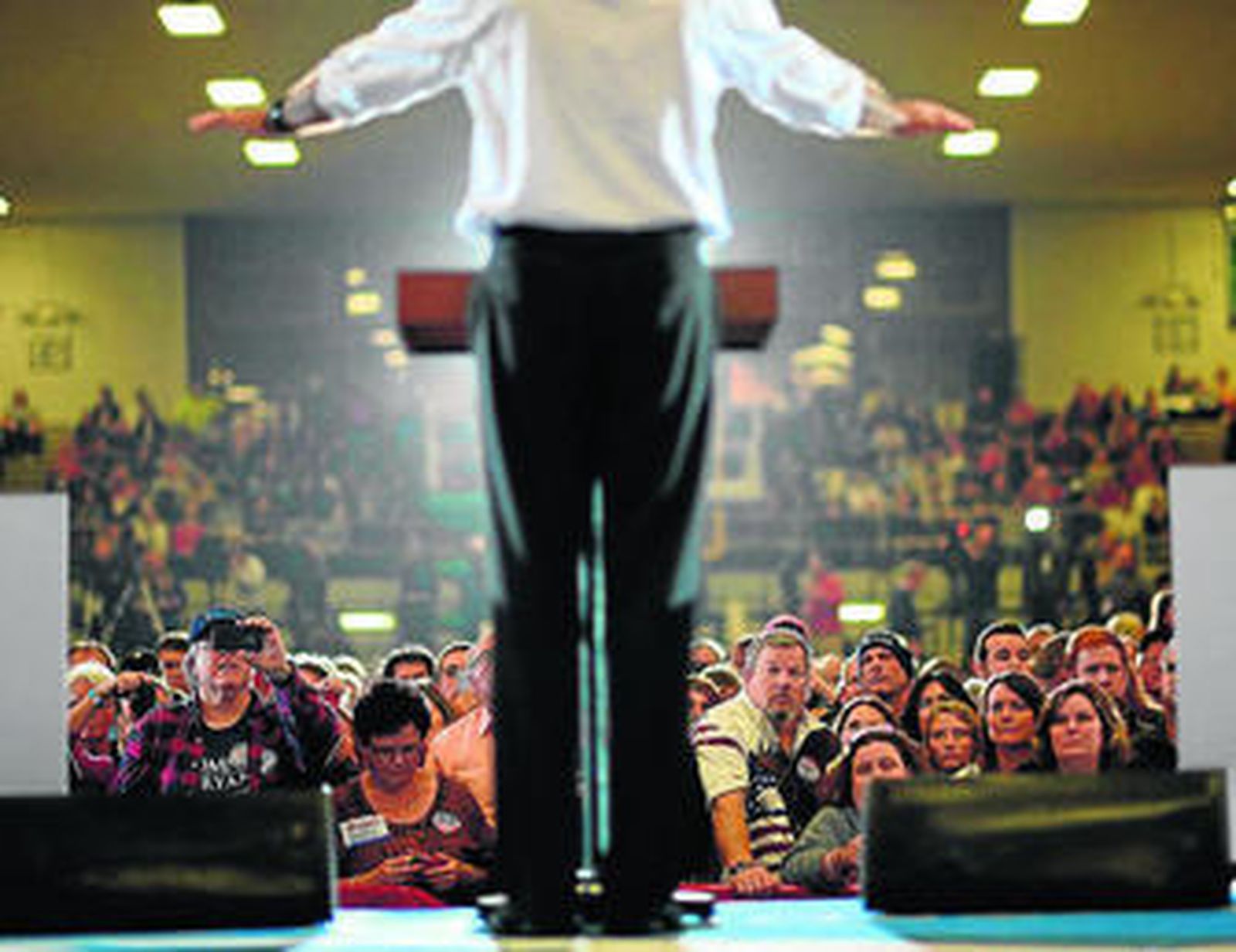 Seguidores del candidato republicano, Mitt Romney, durante un mitin en Marion, Ohio.