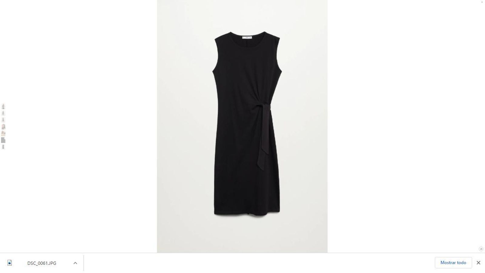 Vestido negro con lazada de Mango. Vestido negro con lazada de Mango.