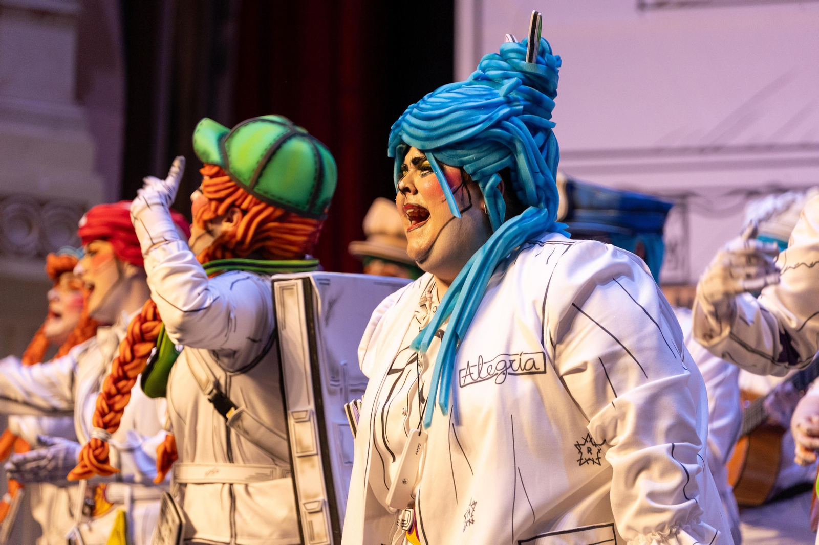 Imágenes de la actuación de la comparsa de Huelva "La Tinta Obrera" en el Carnaval Colombino