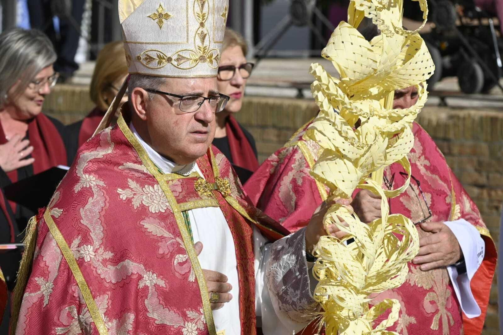 Misa y procesión de Palmas del Domingo de Ramos de Huelva en imágenes