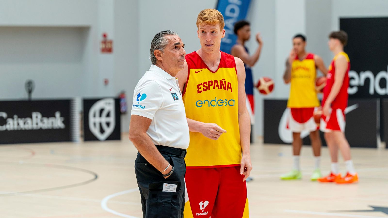 Scariolo, con Alberto Díaz.